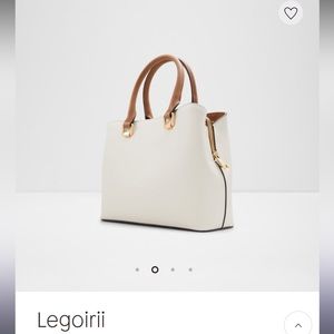 Loved this bag!accidentally placed the order twice! Still in original packaging!